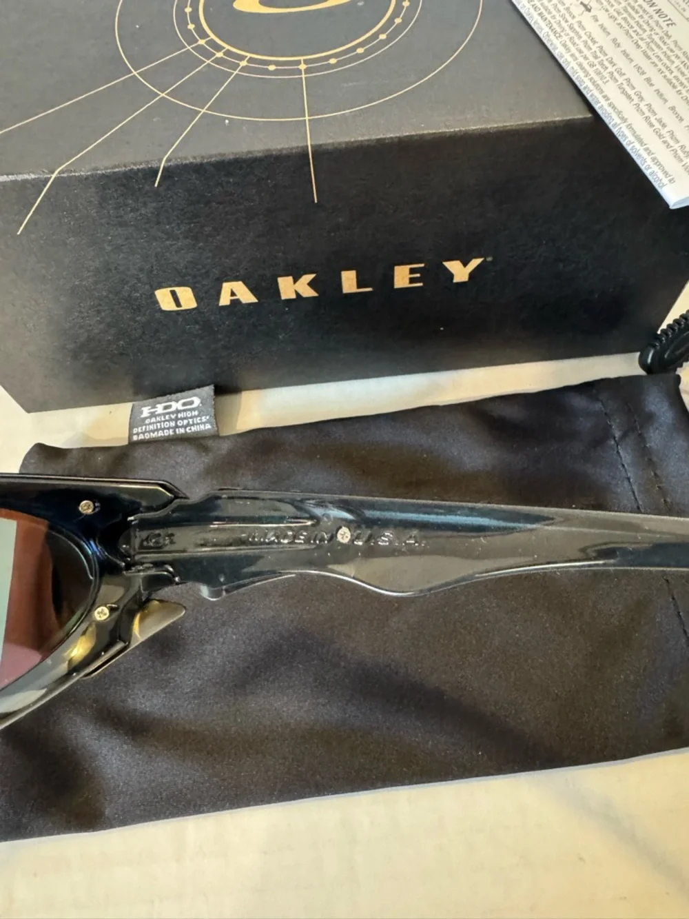 Oakley Black Sunglasses with Orange Mirror Lenses